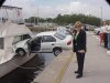 vehicle-hits-docked-boat-woman-driver-steers-off-pier.jpg